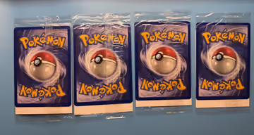 4 sealed movie promo packs – Electabuzz, Pikachu, Dragonite, Mewtwo, Rückseite
